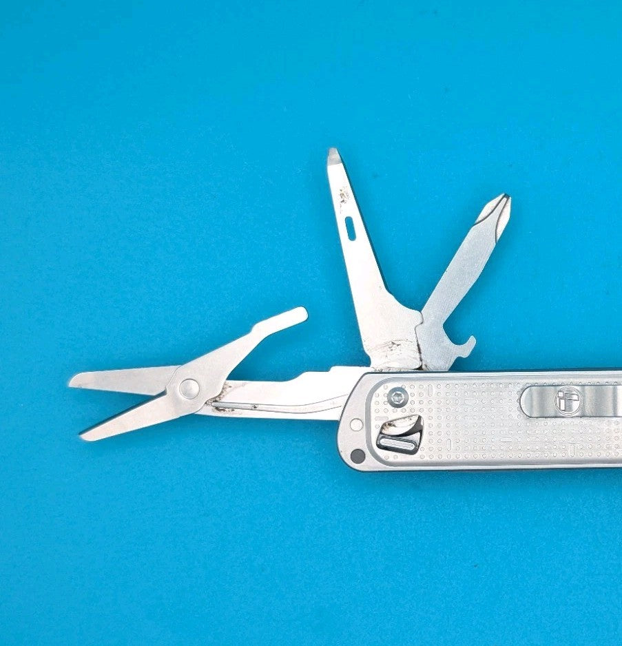 Leatherman FREE T4 Pocket Knife Multi-tool! Stainless! RETIRED!