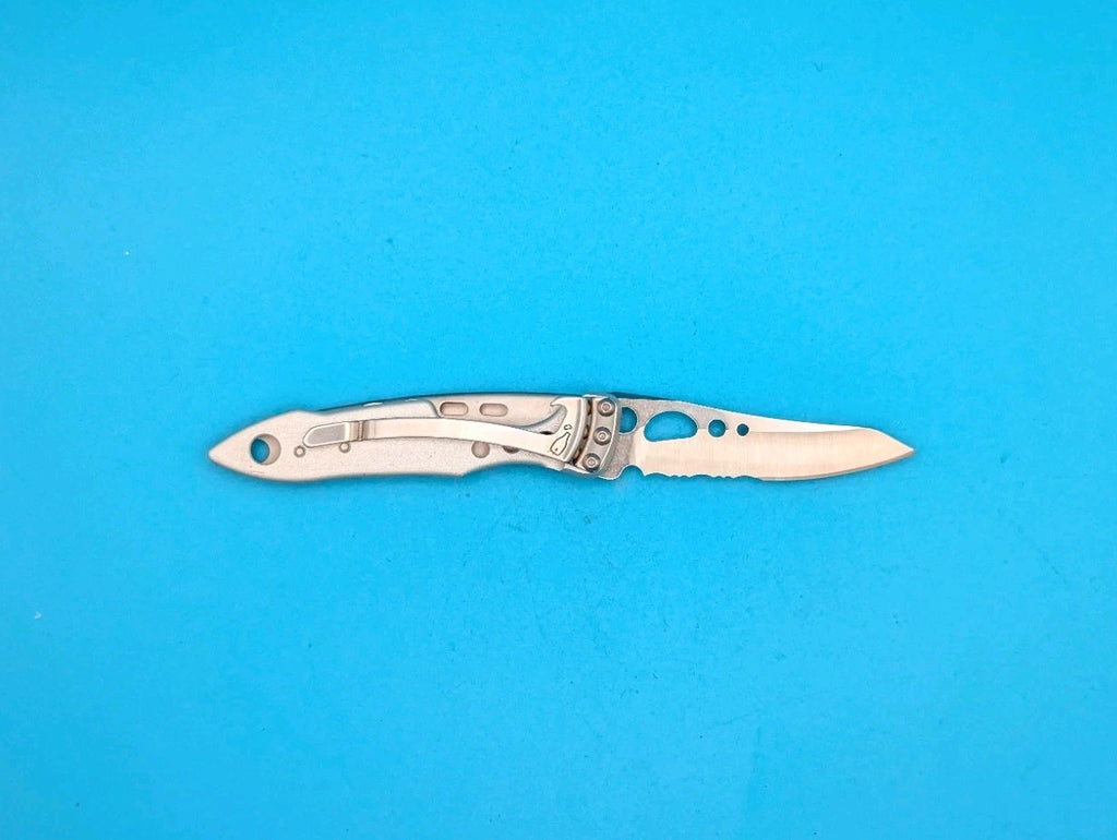 Leatherman Skeletool KBX Pocket Knife w/ Bottle Opener, SILVER!