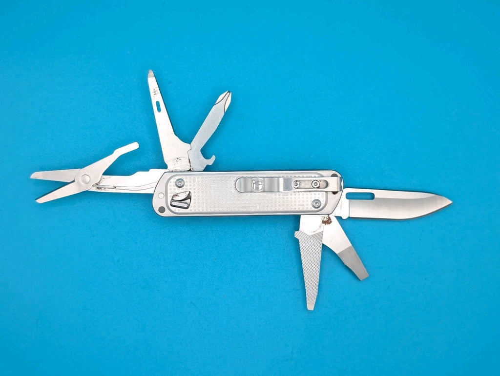 Leatherman FREE T4 Pocket Knife Multi-tool! Stainless! RETIRED!