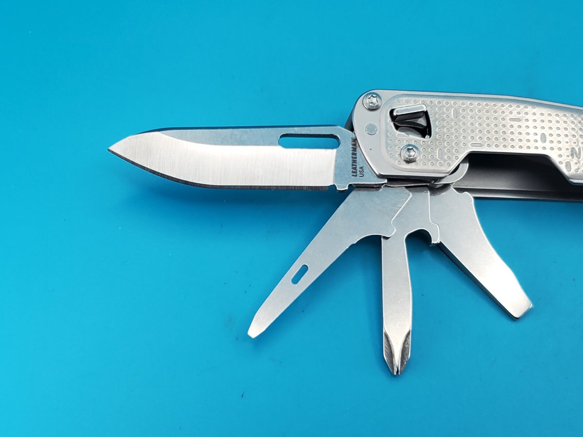 Leatherman FREE T2 Pocket Knife Multi-tool! RAINTREE PARTNERS