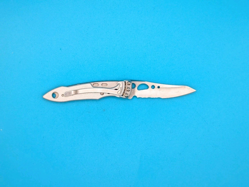 Leatherman Skeletool KBX Pocket Knife w/ Bottle Opener, SILVER!