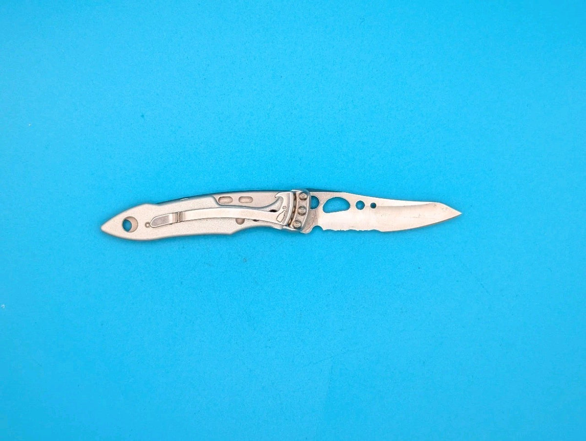 Leatherman Skeletool KBX Pocket Knife w/ Bottle Opener, SILVER!