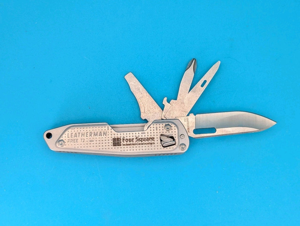 Leatherman FREE T2 Pocket Knife Multi-tool! "FOUR SQUARE"