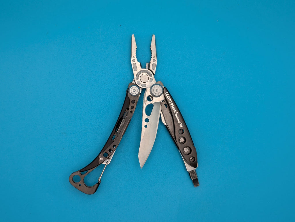 Leatherman Skeletool CX Multitool Plain Edge Knife!