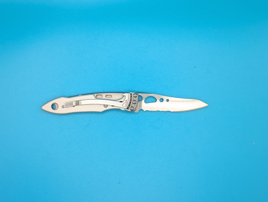 Leatherman Skeletool KBX Pocket Knife w/ Bottle Opener, SILVER!