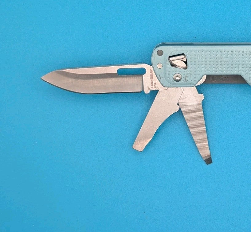 Leatherman FREE T4 Pocket Knife Multi-tool! Teal! RETIRED!