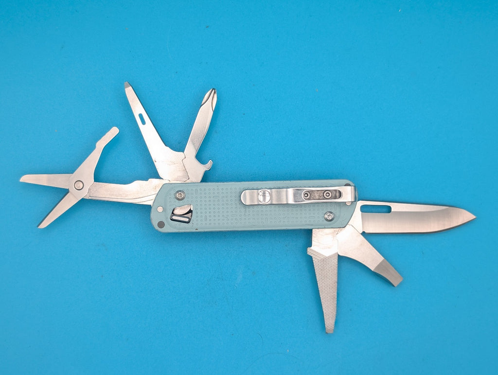Leatherman FREE T4 Pocket Knife Multi-tool! Teal! RETIRED!