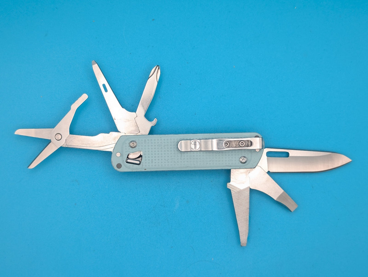 Leatherman FREE T4 Pocket Knife Multi-tool! Teal! RETIRED!