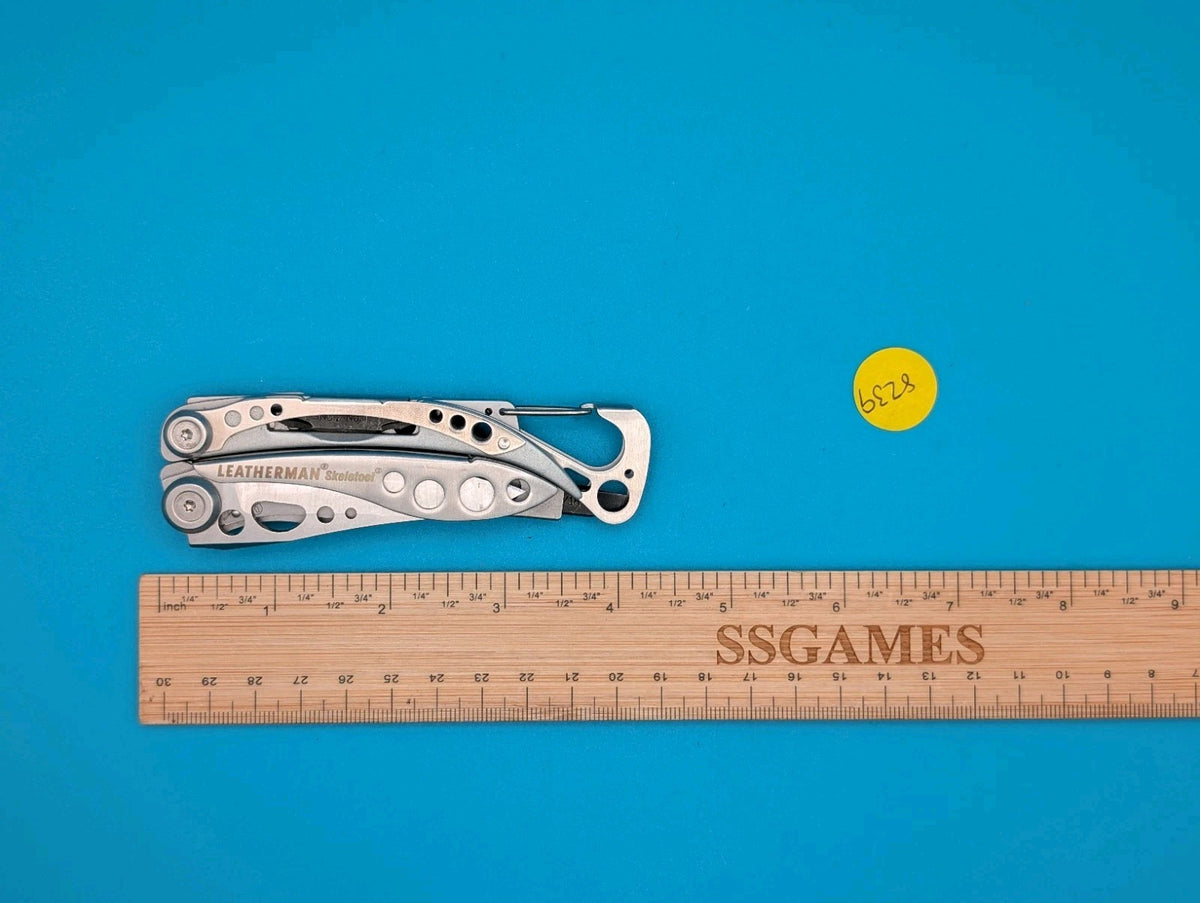 LEATHERMAN Skeletool Multi Tool - Combo Edge Blade Knife Pliers Carabiner!!!