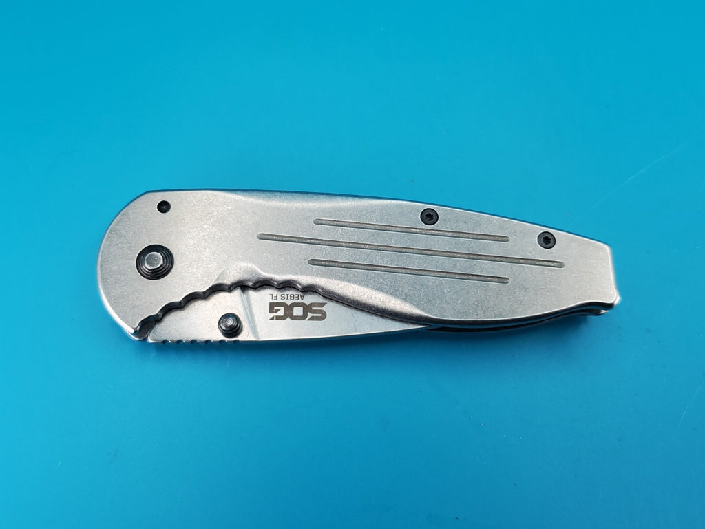 SOG Aegis FL Flipper Knife Frame Lock Plain Edge Blade!