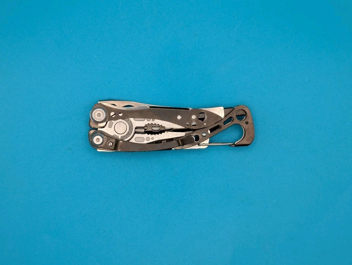 Leatherman Skeletool CX Multitool Plain Edge Knife!