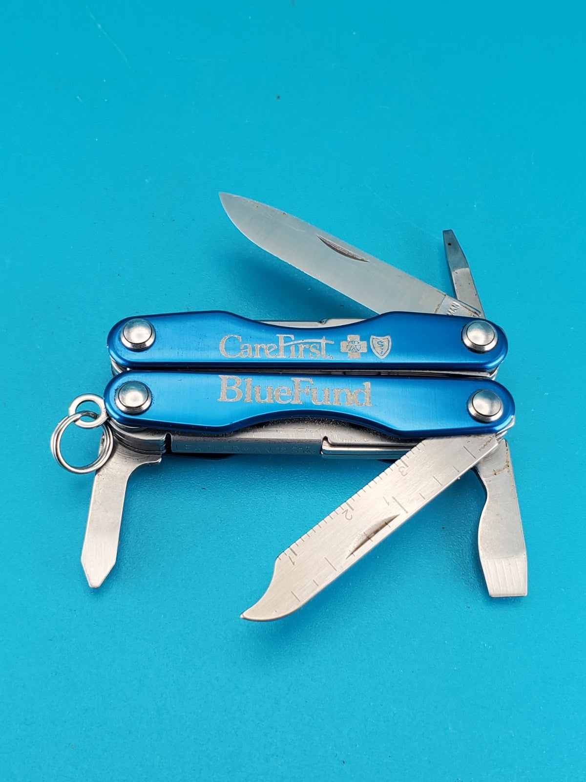 Leatherman Squirt S4 Multi-Tool, Key Ring, Retired, BLUE! CAREFIRST BLUEFUND