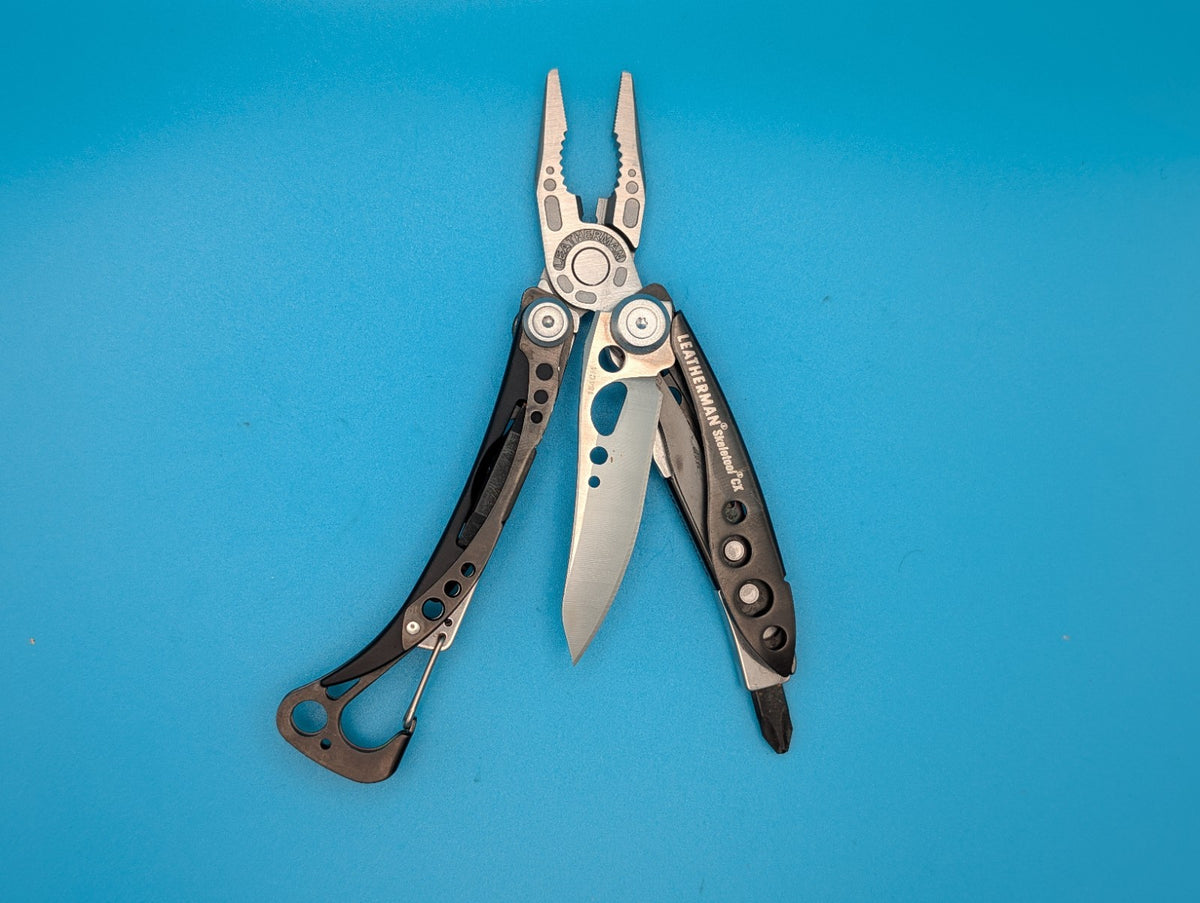 Leatherman Skeletool CX Multitool Plain Edge Knife!