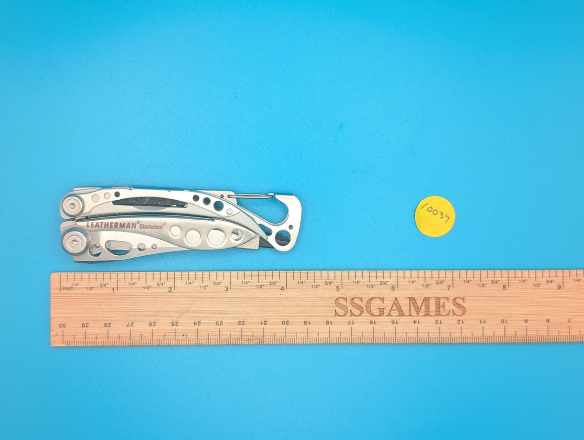 LEATHERMAN Skeletool Multi Tool - Combo Edge Blade Knife Pliers Carabiner!