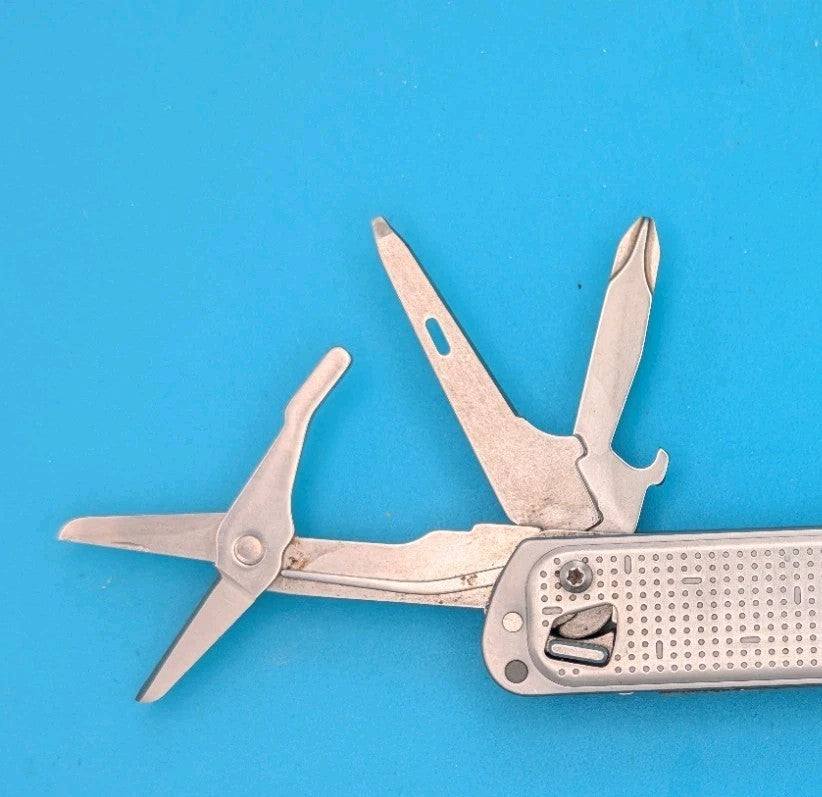 Leatherman FREE T4 Pocket Knife Multi-tool! Stainless! RETIRED!
